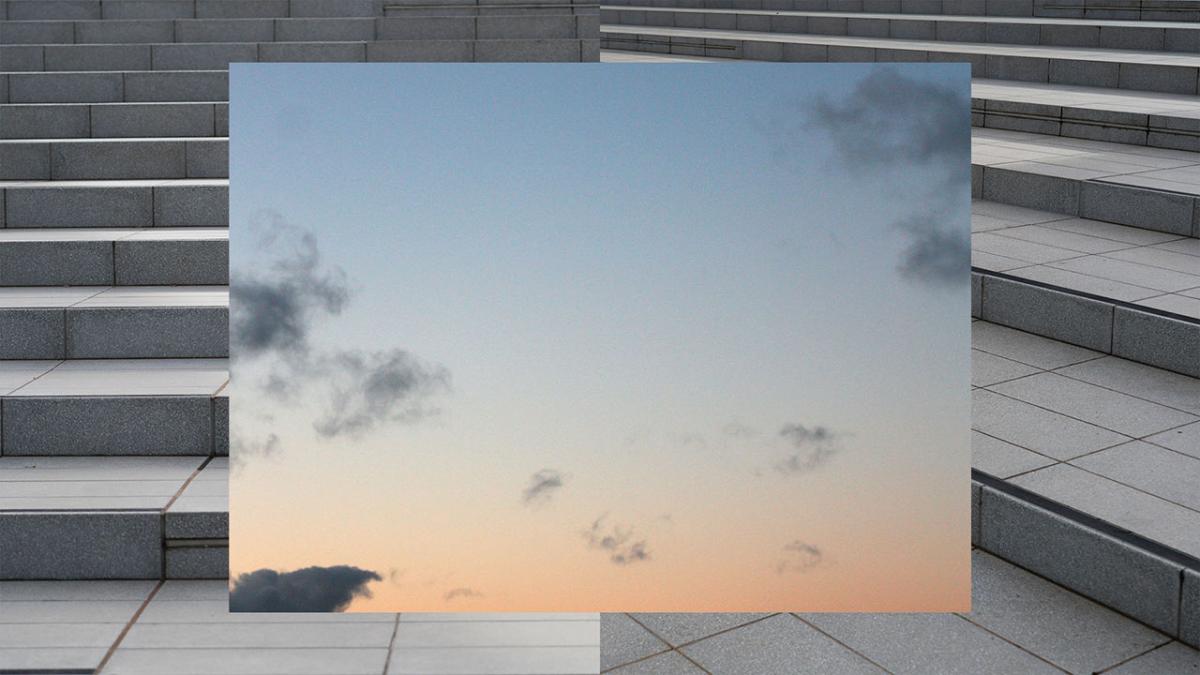 image of twilight sky overlaid on image of concrete steps