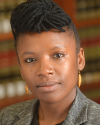 headshot of E Tendayi Achiume