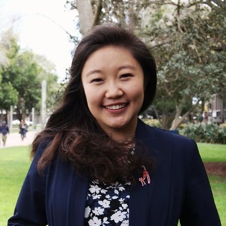 Dr Xue (Sophia) Bai, wearing a dark navy suit