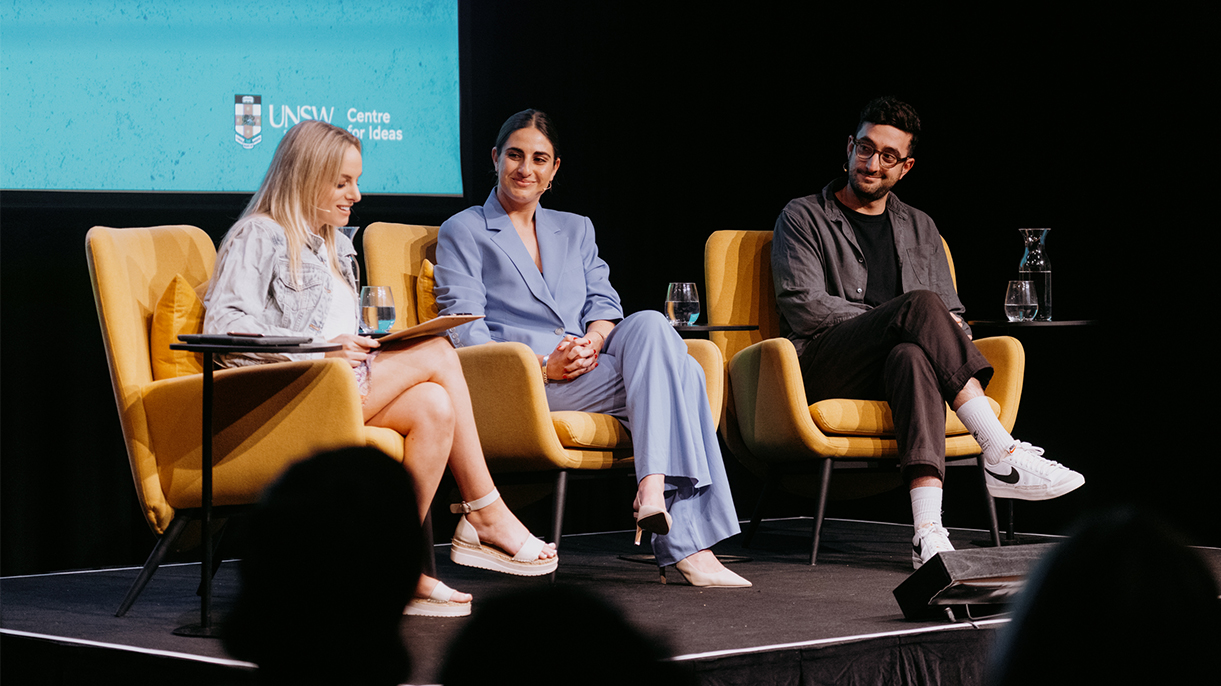 Speakers sitting on stage 