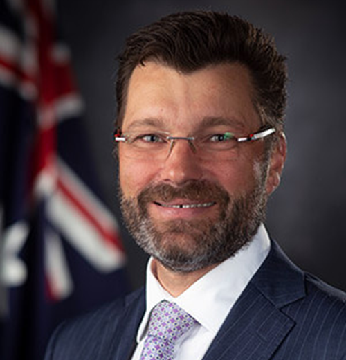 A headshot of Dr Nigel 