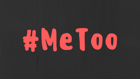 black background with red wriitng saying #metoo