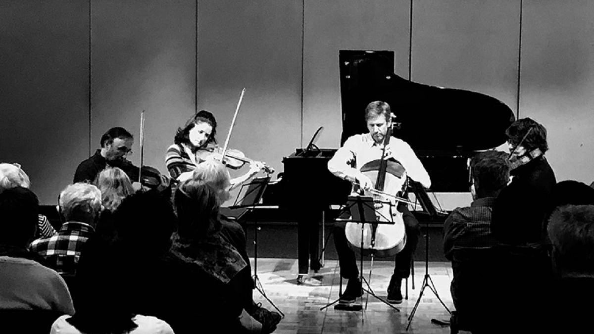 black and white photo of a quartet