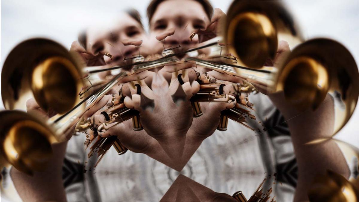 trumpet player as seen through a kaleidoscope