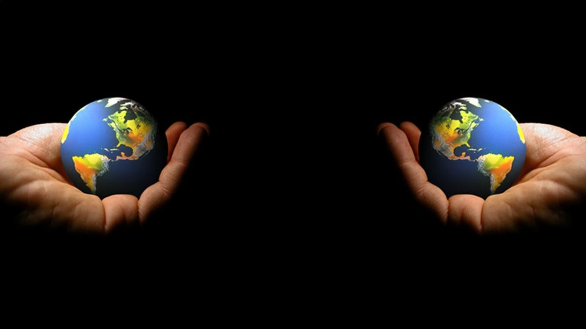 Image of hands holding the earth