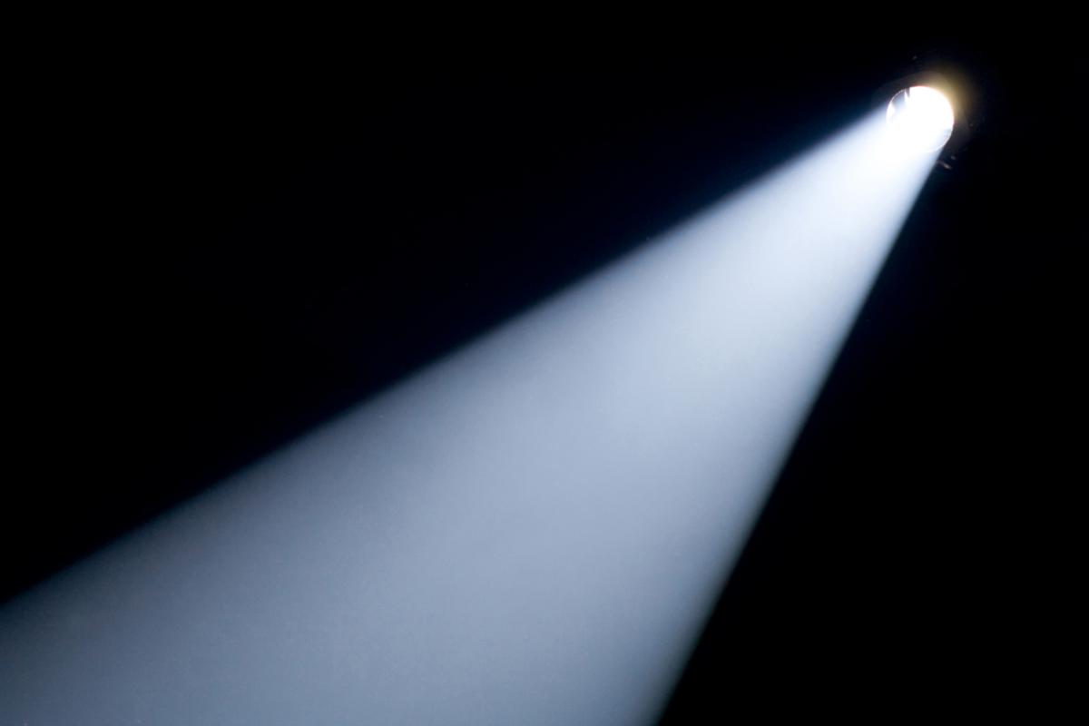 a spotlight shining in the dark