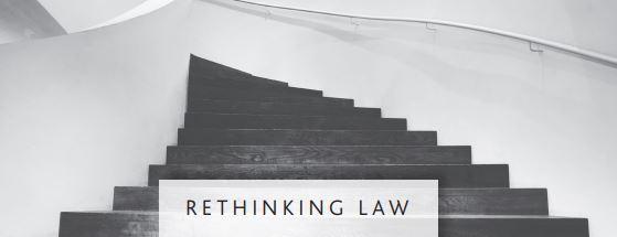 Black and white photo of stairs with the words Rethinking Law