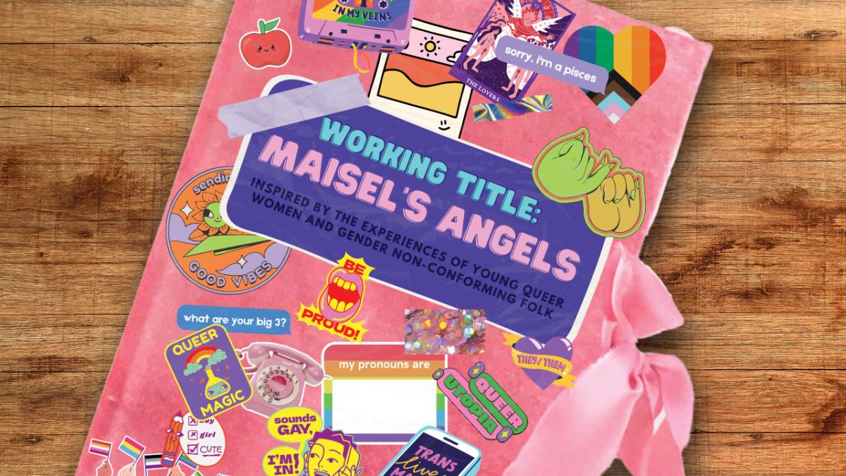 A dairy with the plays title on the cover, littered with queer and trans rights stickers
