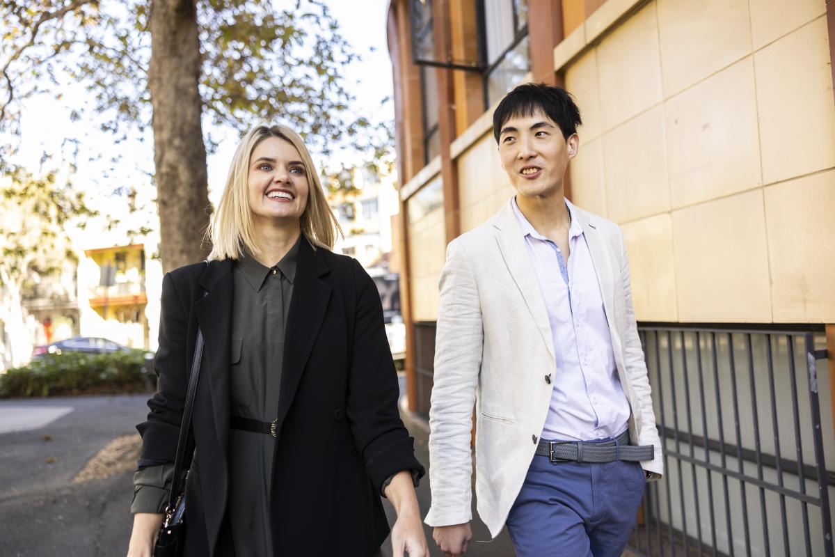 UNSW Juris Doctor Info Evening, two people walking along street.